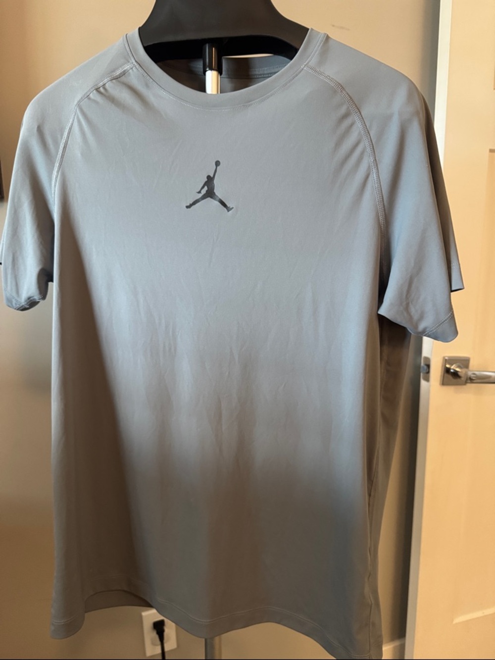 Fitted dri fit Jordan Short-Sleeve Athletic Tee in Light Gray with Black Jumpman